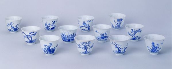 康熙“十二月花卉纹杯”及上所题诗句