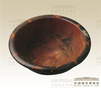 人面鱼纹彩陶盆