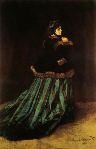 莫奈的油画《The Woman in the Green Dress》（绿衣女人