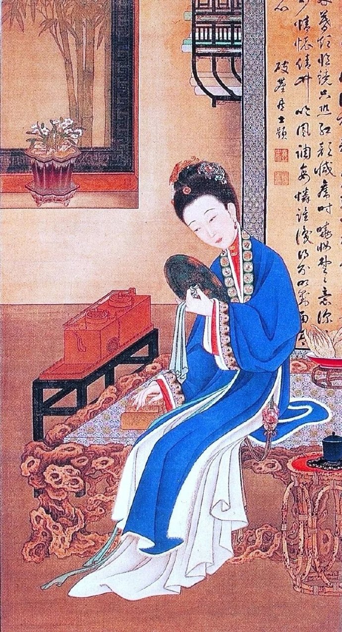 佳人晓妆对镜